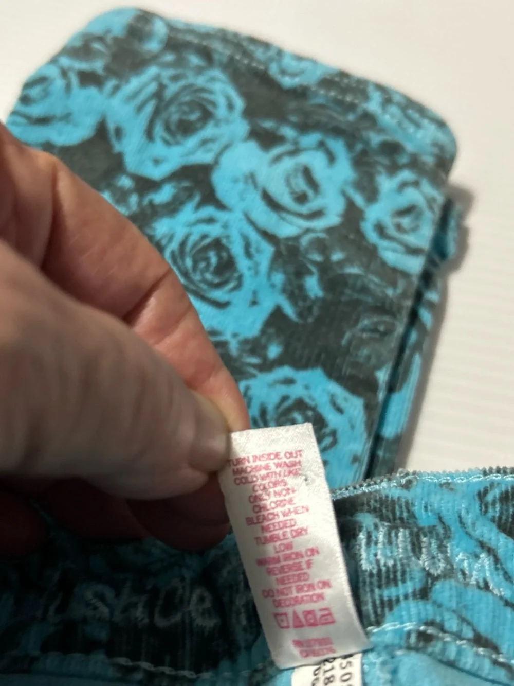 Justice Girls Teal and Black Rose Print Jeans